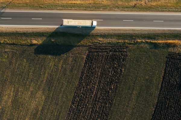 Aerial view of freight transportation truck on the road